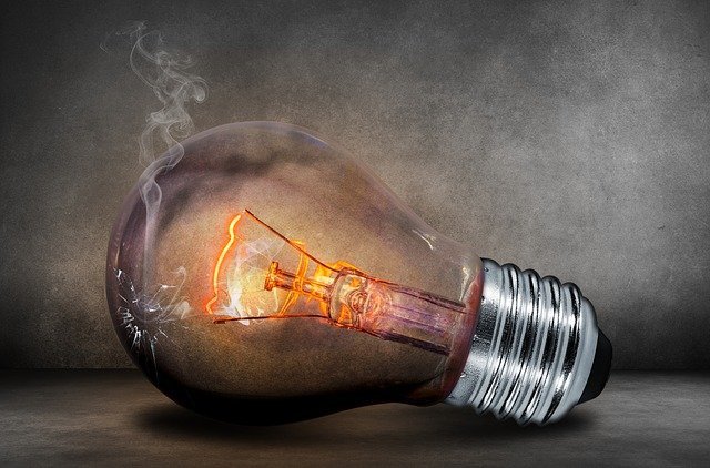 Burned out light bulb symbolizing self-sabotaging behaviors that hurt student productivity.