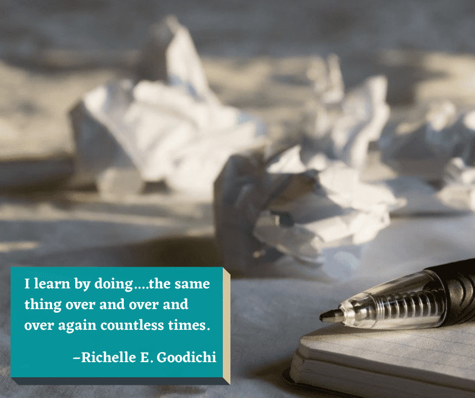 The 16th of the motivational quotes for student success displays a notebook with pen lies on a table with crumpled balls of paper all around it.
