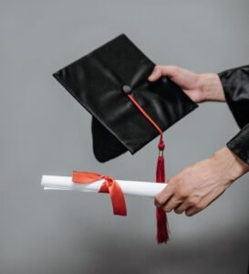 Master's student handed a diploma