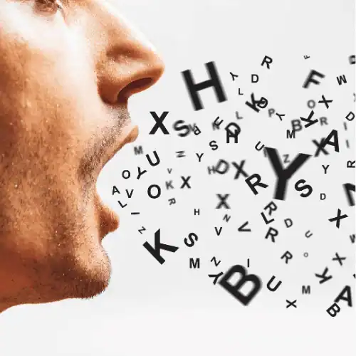 Decorative image for the graduate school glossary shows a cropped face, focusing on an open mouth with letters emerging from it.
