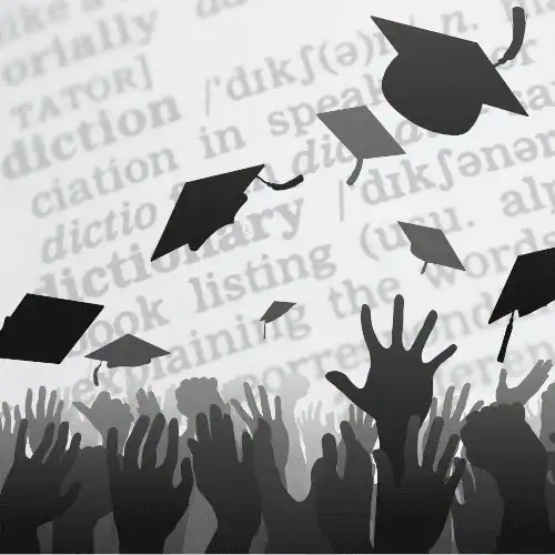 Decorative image for the graduate school glossary shows a close up of a dictionary page overlaid with hands throwing up graduation caps.